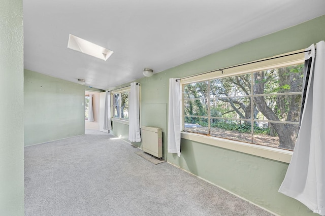 210 Valley View Dr, Petaluma, CA 94952 - unfurnished room with carpet, lofted ceiling, and a skylight