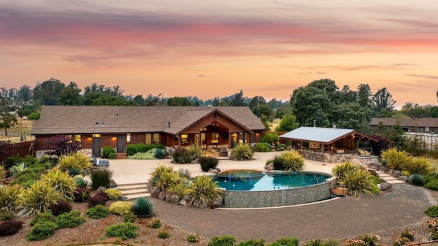 2570 Goodwin Ave, Penngrove, CA 94951 - pool at dusk featuring a patio and an outdoor pool