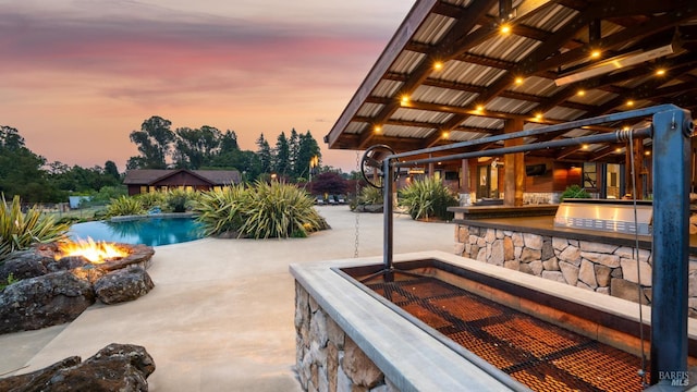 2570 Goodwin Ave, Penngrove, CA 94951 - swimming pool with a fire pit, a patio area, and a bar