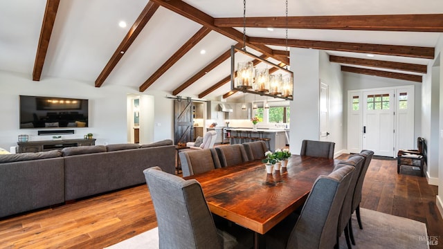2570 Goodwin Ave, Penngrove, CA 94951 - dining space featuring a barn door, recessed lighting, hardwood / wood-style floors, and a chandelier