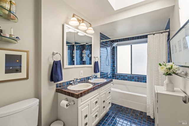 128 Walnut Ave, Mill Valley, CA 94941 - bathroom featuring shower / bath combination with curtain, double vanity, tile patterned flooring, and a skylight
