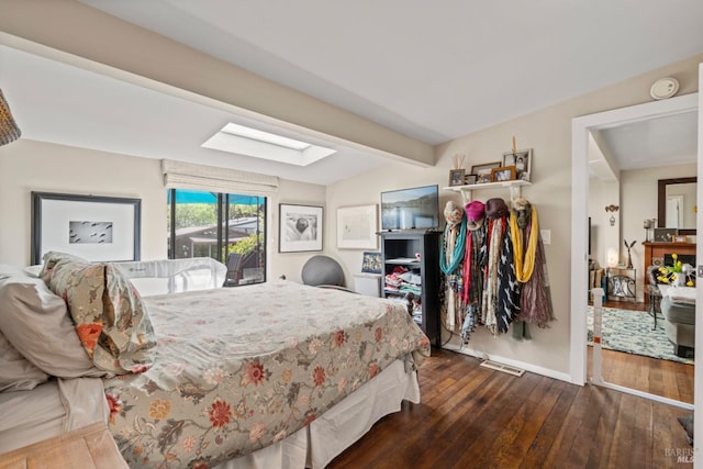 128 Walnut Ave, Mill Valley, CA 94941 - bedroom featuring dark wood-style flooring, a skylight, beam ceiling, and access to exterior