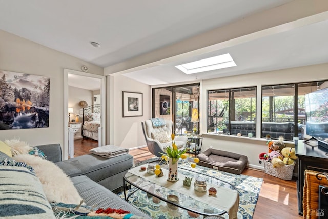 128 Walnut Ave, Mill Valley, CA 94941 - living room with a skylight and wood finished floors
