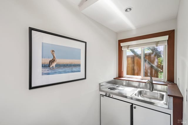128 Walnut Ave, Mill Valley, CA 94941 - kitchen with a sink and white cabinetry