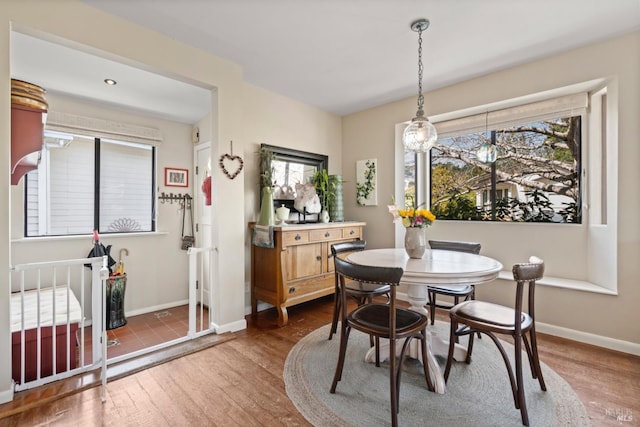 128 Walnut Ave, Mill Valley, CA 94941 - dining space featuring wood finished floors and baseboards