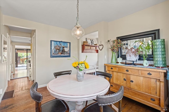 128 Walnut Ave, Mill Valley, CA 94941 - dining area featuring dark wood-type flooring and baseboards