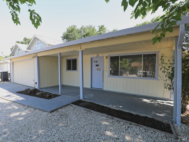 15190 Highlands Hbr, Clearlake, CA 95422 - single story home with a garage, driveway, and covered porch