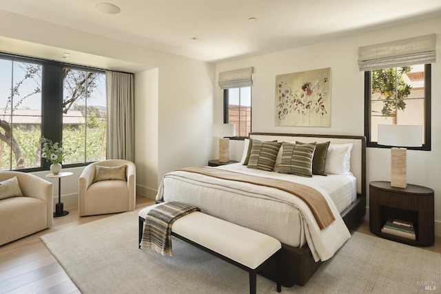106 Vintners Ct, Napa, CA 94559 - bedroom with multiple windows and light wood-style floors