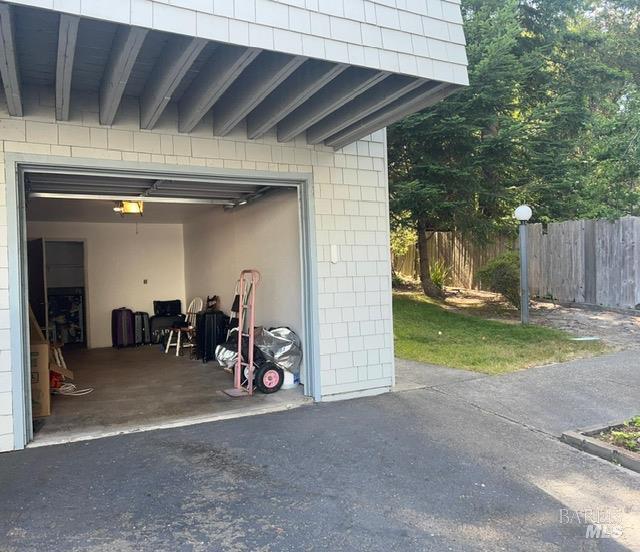 105 Virginia Ave Unit 1, Sebastopol, CA 95472 - garage featuring driveway and a garage door opener