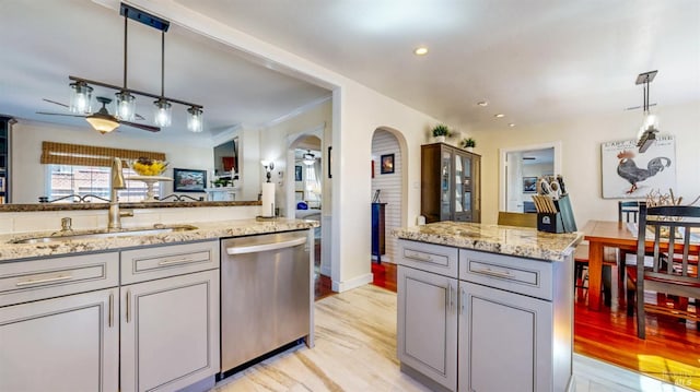 418 W Cotati Ave, Cotati, CA 94931 - kitchen with dishwasher, arched walkways, gray cabinetry, light stone countertops, and hanging light fixtures