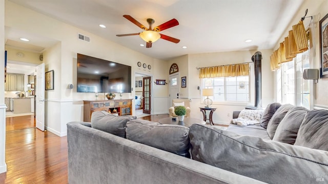 418 W Cotati Ave, Cotati, CA 94931 - living area with ceiling fan, wood finished floors, recessed lighting, a wood stove, and a fireplace