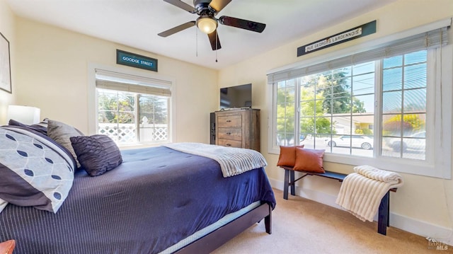 418 W Cotati Ave, Cotati, CA 94931 - carpeted bedroom featuring multiple windows and ceiling fan