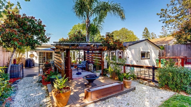 418 W Cotati Ave, Cotati, CA 94931 - fenced backyard featuring a deck, a pergola, an outdoor fire pit, and a shed