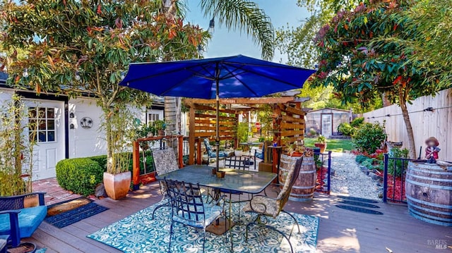 418 W Cotati Ave, Cotati, CA 94931 - wooden terrace featuring outdoor dining area, a fenced backyard, and a shed