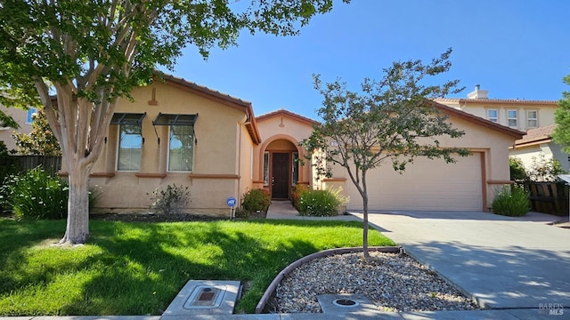 27 Via La Morra, American Canyon, CA 94503 - mediterranean / spanish-style house featuring an attached garage, driveway, and stucco siding