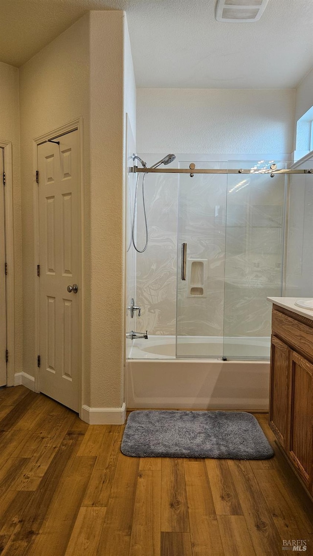 27 Via La Morra, American Canyon, CA 94503 - full bath with enclosed tub / shower combo, wood finished floors, and vanity