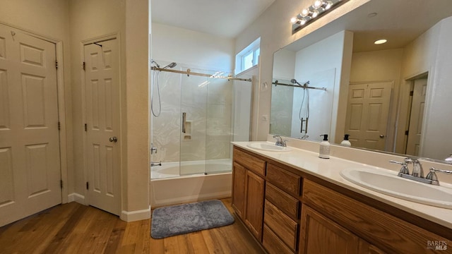 27 Via La Morra, American Canyon, CA 94503 - bathroom featuring wood finished floors, bath / shower combo with glass door, and double vanity