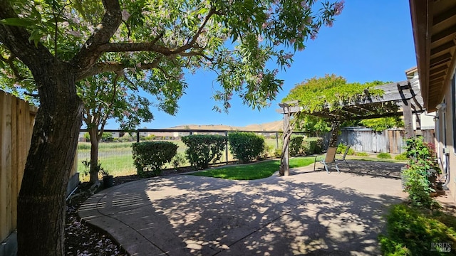 27 Via La Morra, American Canyon, CA 94503 - fenced backyard featuring a pergola and a patio area