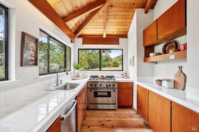 10 Miwok Way, Inverness, CA 94937 - kitchen with appliances with stainless steel finishes, tile counters, wood ceiling, light wood-style flooring, and healthy amount of natural light