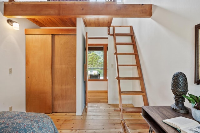 10 Miwok Way, Inverness, CA 94937 - bedroom with light wood-type flooring, a closet, and a wood ceiling with exposed beams