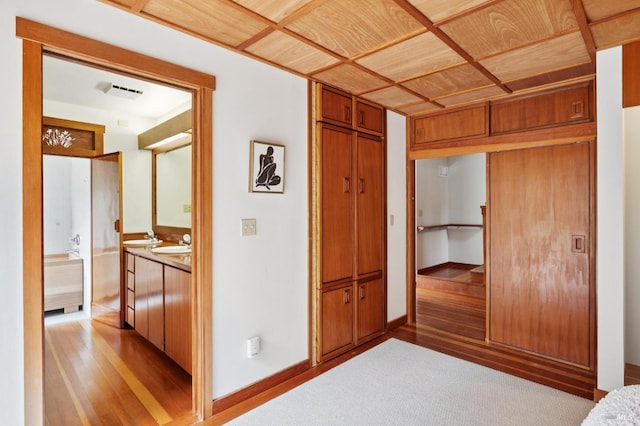 10 Miwok Way, Inverness, CA 94937 - corridor featuring a sink and wood finished floors