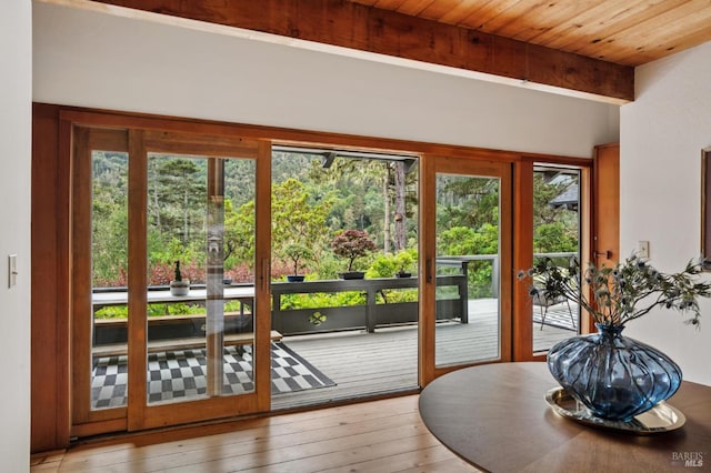 10 Miwok Way, Inverness, CA 94937 - doorway featuring hardwood / wood-style flooring and a wood ceiling with exposed beams