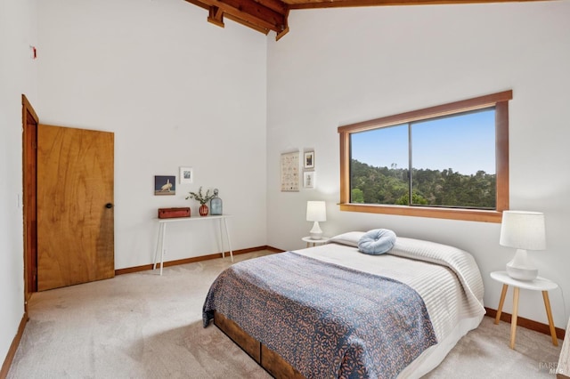 10 Miwok Way, Inverness, CA 94937 - carpeted bedroom with high vaulted ceiling and beamed ceiling