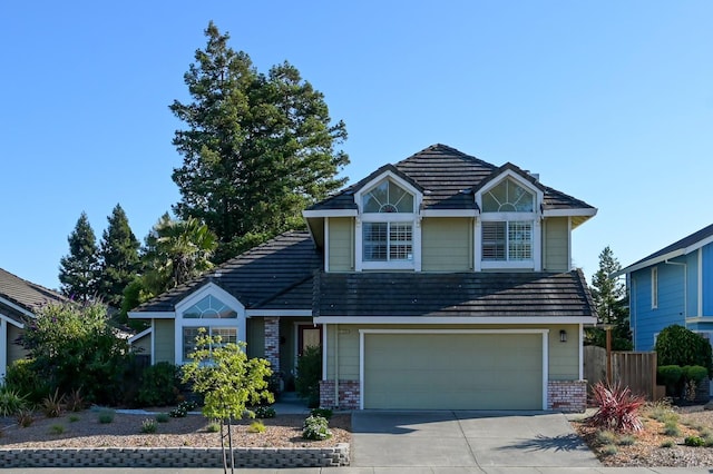 2128 Saint Augustine Cir, Petaluma, CA 94954 - view of front facade with concrete driveway, brick siding, and an attached garage