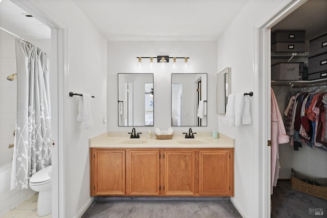 2128 Saint Augustine Cir, Petaluma, CA 94954 - bathroom featuring double vanity, shower / bath combination with curtain, and a walk in closet
