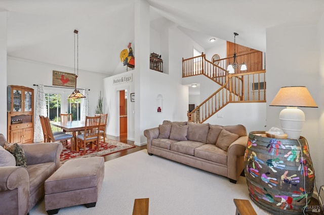 2128 Saint Augustine Cir, Petaluma, CA 94954 - living area featuring a chandelier, stairway, high vaulted ceiling, and wood finished floors