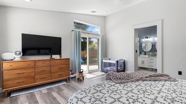 705 Wiegand Way, Dixon, CA 95620 - bedroom featuring access to exterior, wood finished floors, connected bathroom, and recessed lighting