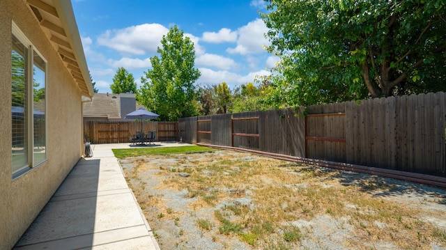 705 Wiegand Way, Dixon, CA 95620 - fenced backyard with a patio