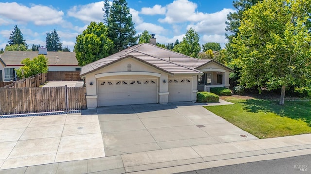 705 Wiegand Way, Dixon, CA 95620 - single story home featuring driveway, an attached garage, a tiled roof, stucco siding, and a chimney