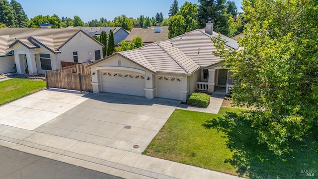 705 Wiegand Way, Dixon, CA 95620 - ranch-style house featuring a tile roof, a garage, and a chimney