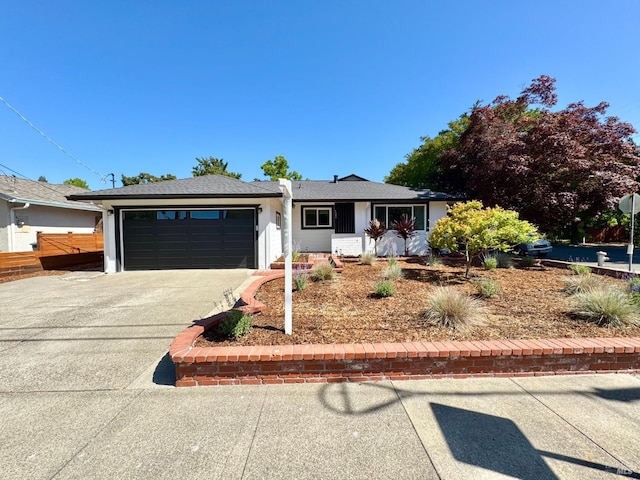 2300 W Park Ave, Napa, CA 94558 - ranch-style home featuring concrete driveway, a garage, and a shingled roof