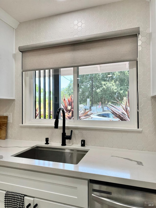2300 W Park Ave, Napa, CA 94558 - kitchen with dishwasher, white cabinetry, light stone counters, and decorative backsplash