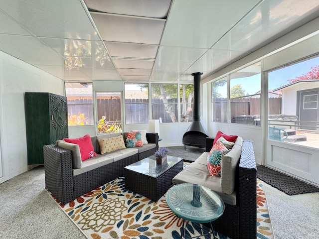 2300 W Park Ave, Napa, CA 94558 - sunroom with a wood stove, outdoor lounge area, and carpet flooring