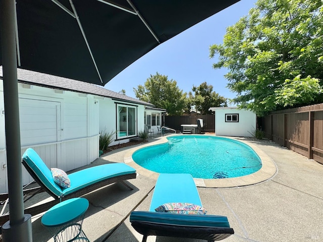 2300 W Park Ave, Napa, CA 94558 - view of swimming pool featuring a patio, a fenced backyard, and a storage unit
