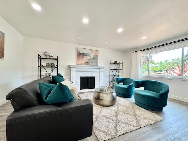 2300 W Park Ave, Napa, CA 94558 - living area featuring light wood-type flooring, recessed lighting, and a tile fireplace