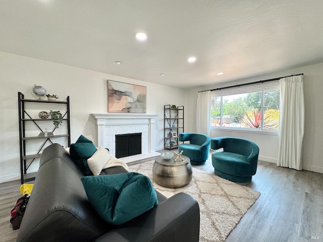 2300 W Park Ave, Napa, CA 94558 - living area with wood finished floors, recessed lighting, and a tile fireplace