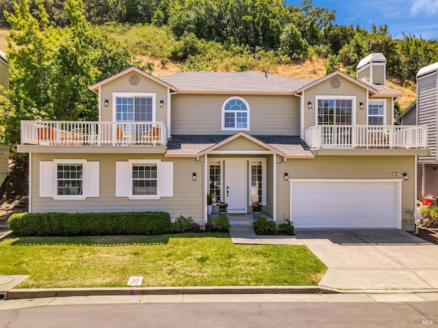 339 Sterling Way, San Rafael, CA 94903 - view of front of home with a balcony, a front lawn, concrete driveway, a garage, and a shingled roof