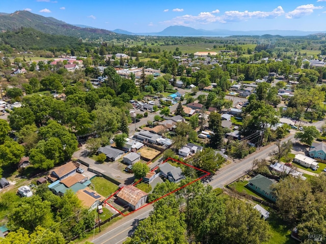 9748 Middle Creek Rd, Upper Lake, CA 95485 - aerial perspective of suburban area featuring property boundaries highlighted and mountains