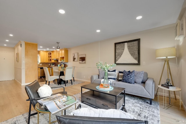 900 Southampton Rd Unit 123, Benicia, CA 94510 - living room with recessed lighting, light wood finished floors, and ornamental molding
