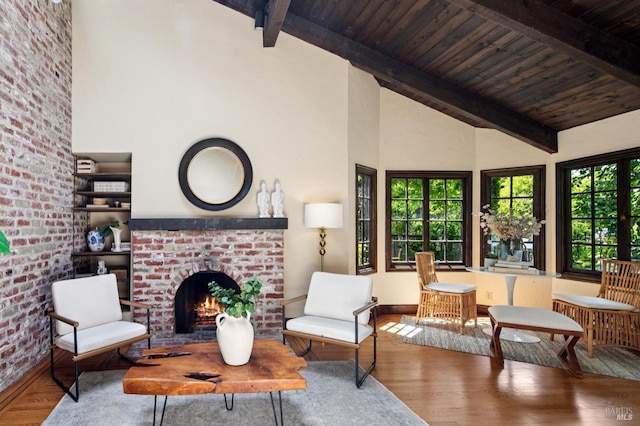 7 Shanley Ln, Ross, CA 94957 - sitting room featuring high vaulted ceiling, a wooden ceiling with exposed beams, a brick fireplace, and wood finished floors