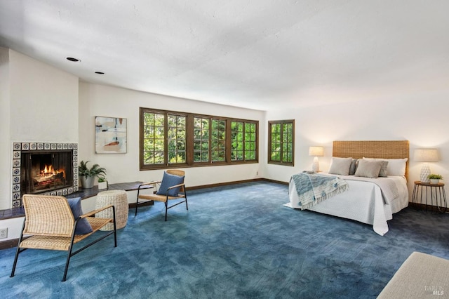 7 Shanley Ln, Ross, CA 94957 - bedroom with multiple windows, dark carpet, and a fireplace