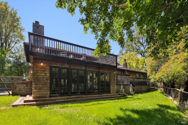 7 Shanley Ln, Ross, CA 94957 - back of property with a yard, a chimney, french doors, and a wooden deck
