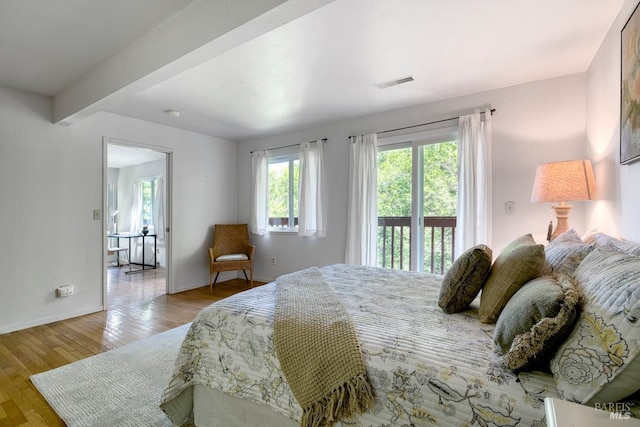 173 Marina Vista Ave, Larkspur, CA 94939 - bedroom featuring access to outside, wood finished floors, and beam ceiling