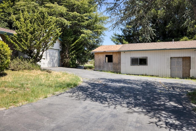 1415 Schaeffer Rd, Sebastopol, CA 95472 - view of front of property featuring asphalt driveway and a garage