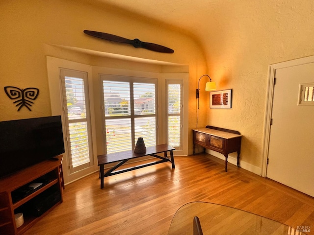 436 S Front St, Rio Vista, CA 94571 - sitting room with a textured wall and light wood-style flooring