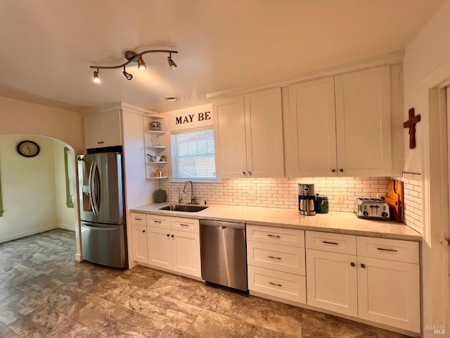 436 S Front St, Rio Vista, CA 94571 - kitchen featuring appliances with stainless steel finishes, white cabinetry, tasteful backsplash, and light stone counters